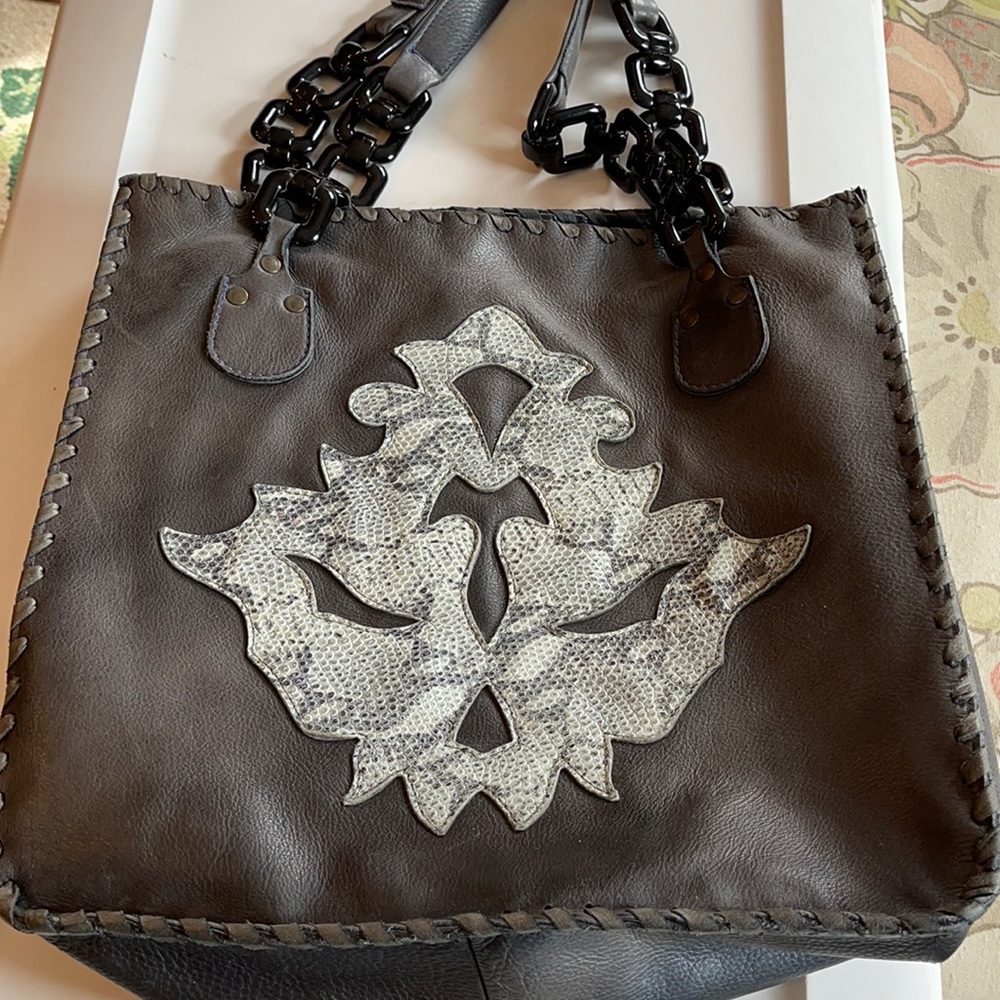 Leather and skins tote unique and functional